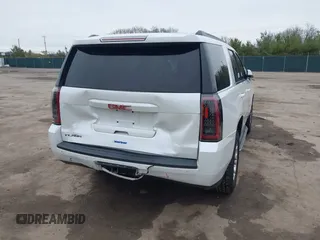 2016 GMC Yukon SLT with VIN 1GKS2BKC5GR374815, listed as a IAAI auction lot 41889495 with 163,464 mi miles. Bid and sale history available at carsss.com. Image 4.