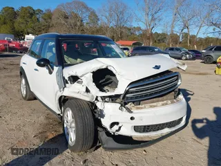 2015 MINI Countryman z VIN WMWZB3C53FWR43884, wystawiony jako IAAI lot #41296213 z przebiegiem 111 934 mil mil oraz . Historia ofert i sprzedaży dostępna na DreamBid. Obrazek 6.