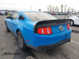 2012 Ford Mustang V6 Premium with VIN 1ZVBP8AM4C5271247, listed as a IAAI auction lot 41667475 with 150,700 mi miles. Bid and sale history available at carsss.com. Image 3.