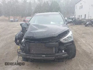 2018 Hyundai Santa Fe 2.4L z VIN 5NMZUDLB7JH098638, wystawiony jako IAAI lot #42055793 z przebiegiem 63 516 mil mil oraz . Historia ofert i sprzedaży dostępna na DreamBid. Obrazek 6.