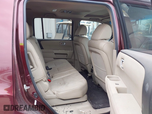 2012 Honda Pilot EX-L with VIN 5FNYF4H65CB045796, listed as a IAAI auction lot 39867772 with 104,061 mi miles. Bid and sale history available at carsss.com. Image 8.