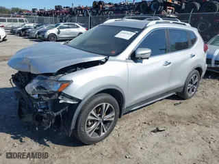 2019 Nissan Rogue SV with VIN JN8AT2MT9KW263300, listed as a IAAI auction lot 41853629 with 104,654 mi miles. Bid and sale history available at carsss.com. Image 2.
