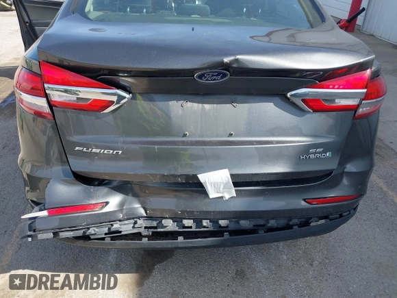 2019 Ford Fusion Hybrid SE with VIN 3FA6P0LU6KR163927, listed as a IAAI auction lot 41834612 with 104,342 mi miles. Bid and sale history available at carsss.com. Image 6.