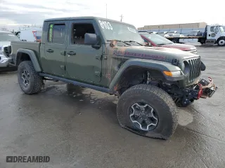 2022 Jeep Gladiator Rubicon with VIN 1C6JJTBMXNL173279, listed as a Copart auction lot 85455834 with 0 mi miles and Salvage Title. Bid and sale history available at carsss.com. Image 4.
