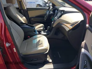 2014 Hyundai Santa Fe z VIN 5XYZUDLB3EG226857, wystawiony jako IAAI lot #41917762 z przebiegiem 42 677 mil mil oraz . Historia ofert i sprzedaży dostępna na DreamBid. Obrazek 5.