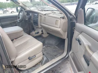 2002 Dodge 1500 z VIN 1D7HA16K22J265651, wystawiony jako IAAI lot #42451513 z przebiegiem 231 770 mil mil oraz . Historia ofert i sprzedaży dostępna na DreamBid. Obrazek 5.