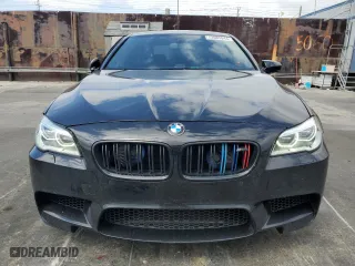 2015 BMW M5 with VIN WBSFV9C56FD594465, listed as a Copart auction lot 72085944 with 76,313 mi miles and Salvage Title. Bid and sale history available at carsss.com. Image 5.