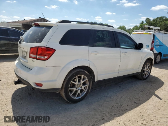 2015 Dodge Journey SXT with VIN 3C4PDCBB2FT651158, listed as a Copart auction lot 52982285 with 130,546 mi miles and Salvage Title. Bid and sale history available at carsss.com. Image 3.