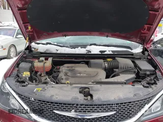 2017 Chrysler Pacifica Touring L Plus with VIN 2C4RC1EG6HR652908, listed as a IAAI auction lot 41381104 with 82,186 mi miles and . Bid and sale history available at DreamBid. Image 10.