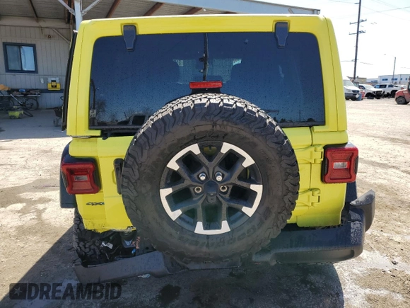 2024 Jeep Wrangler Rubicon z VIN 1C4RJXR64RW193946, wystawiony jako Copart lot #51693105 z przebiegiem 4 863 mil mil oraz Szkoda całkowita • Salvage title. Historia ofert i sprzedaży dostępna na DreamBid. Obrazek 6.