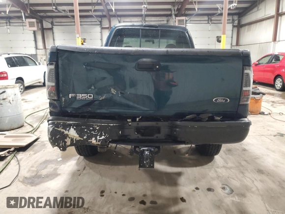 1999 Ford F-350 XL with VIN 1FTSX31S9XEA95645, listed as a Copart auction lot 43423285 with 169,449 mi miles and Salvage Title. Bid and sale history available at DreamBid. Image 6.