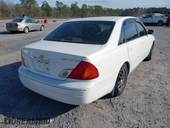 2001 Toyota Avalon XL with VIN 4T1BF28B41U176662, listed as a IAAI auction lot 41740076 with 381,657 mi miles and . Bid and sale history available at carsss.com. Image 4.