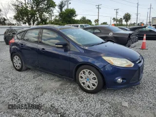2012 Ford Focus SE z VIN 1FAHP3K22CL126478, wystawiony jako Copart lot #60053565 z przebiegiem 130 887 mil mil oraz Czysty tytuł • Clean title. Historia ofert i sprzedaży dostępna na DreamBid. Obrazek 4.
