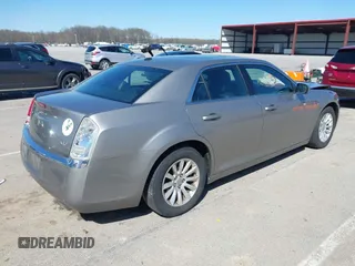 2014 Chrysler 300 z VIN 2C3CCAAGXEH335800, wystawiony jako IAAI lot #41984427 z przebiegiem 247 358 mil mil oraz . Historia ofert i sprzedaży dostępna na DreamBid. Obrazek 4.