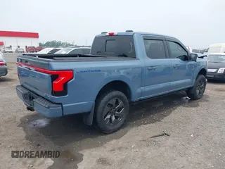 2023 Ford F-150 Lightning Pro with VIN 1FT6W1EVXPWG53591, listed as a IAAI auction lot 42249385 with 17,892 mi miles and . Bid and sale history available at DreamBid. Image 4.