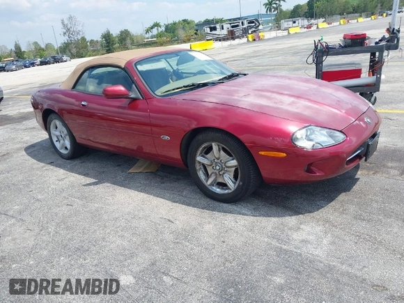 1997 Jaguar XK with VIN SAJGX2743VC017588, listed as a IAAI auction lot 42055716 with 66,052 mi miles and . Bid and sale history available at DreamBid. Image 1.