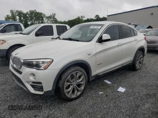 2015 BMW X4 xDrive28i z VIN 5UXXW3C53F0M87109, wystawiony jako Copart lot #54507325 z przebiegiem 115 989 mil mil oraz Tytuł czysty. Historia ofert i sprzedaży dostępna na DreamBid. Obrazek 1.