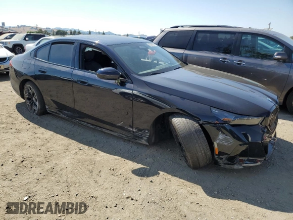 2024 BMW i5 eDrive40 with VIN WBY33FK03RCS14771, listed as a Copart auction lot 62393255 with 25,192 mi miles and Salvage title. Bid and sale history available at DreamBid. Image 4.