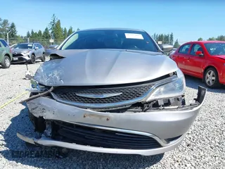 2015 Chrysler 200 Limited with VIN 1C3CCCAB1FN595950, listed as a IAAI auction lot 42627486 with 217,578 mi miles and . Bid and sale history available at DreamBid. Image 13.