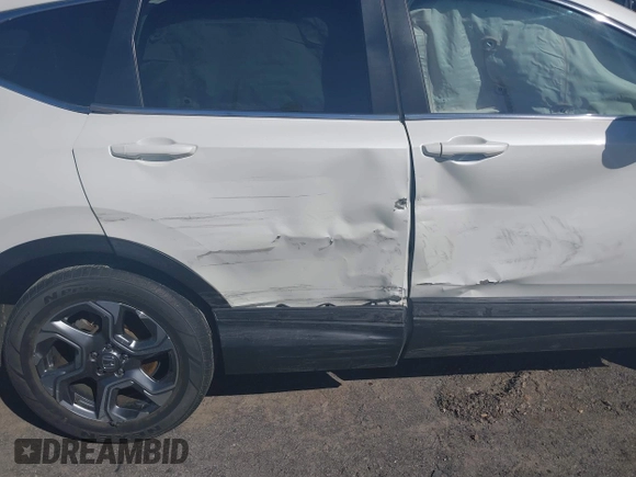 2017 Honda CR-V EX with VIN 2HKRW1H58HH519386, listed as a IAAI auction lot 41777509 with 76,499 mi miles. Bid and sale history available at carsss.com. Image 6.