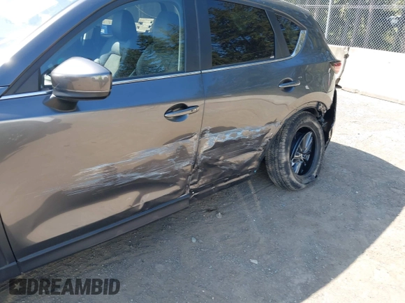 2020 Mazda CX-5 Touring with VIN JM3KFBCM6L1828691, listed as a IAAI auction lot 42100409 with 25,182 mi miles. Bid and sale history available at carsss.com. Image 18.