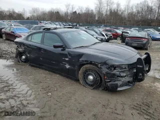 2023 Dodge Charger Police with VIN 2C3CDXKG6PH613514, listed as a Copart auction lot 46024455 with 6,910 mi miles and Salvage Title. Bid and sale history available at carsss.com. Image 4.
