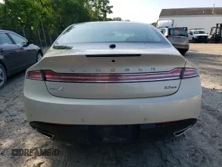 2015 Lincoln MKZ z VIN 3LN6L2JK4FR629312, wystawiony jako Copart lot #60230405 z przebiegiem 79 570 mil mil oraz Szkoda całkowita • Salvage title. Historia ofert i sprzedaży dostępna na DreamBid. Obrazek 6.