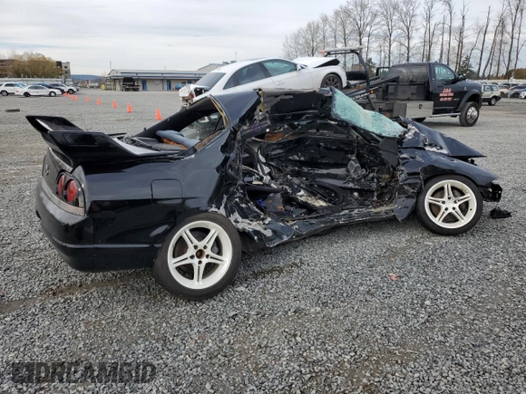 1995 Nissan Skyline z VIN ECR33051933, wystawiony jako Copart lot #79976684 z przebiegiem Nie podano mil oraz Szkoda całkowita • Salvage title. Historia ofert i sprzedaży dostępna na DreamBid. Obrazek 3.