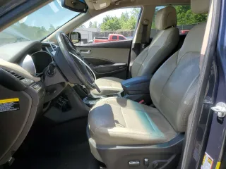 2017 Hyundai Santa Fe 2.4L z VIN 5NMZUDLB7HH028678, wystawiony jako Copart lot #57557855 z przebiegiem 102 049 mil mil oraz Szkoda całkowita • Salvage title. Historia ofert i sprzedaży dostępna na DreamBid. Obrazek 7.