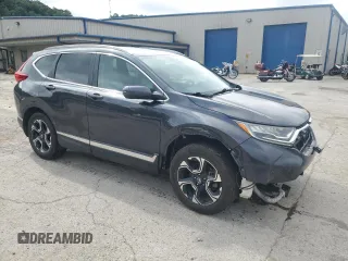 2018 Honda CR-V Touring with VIN 2HKRW2H91JH688325, listed as a Copart auction lot 63619555 with 124,962 mi miles and Salvage title. Bid and sale history available at DreamBid. Image 4.