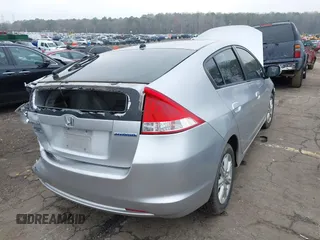 2010 Honda Insight EX with VIN JHMZE2H77AS022538, listed as a IAAI auction lot 41804579 with 184,000 mi miles and . Bid and sale history available at DreamBid. Image 4.