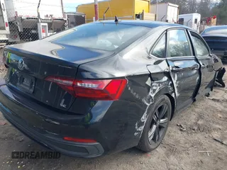 2023 Volkswagen Jetta SE z VIN 3VW7M7BU1PM039129, wystawiony jako IAAI lot #41905547 z przebiegiem 20 188 mil mil oraz . Historia ofert i sprzedaży dostępna na DreamBid. Obrazek 4.