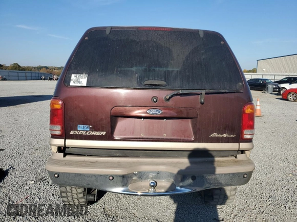2000 Ford Explorer Eddie Bauer z VIN 1FMDU84P0YZB89831, wystawiony jako Copart lot #77874224 z przebiegiem 209 532 mil mil oraz Szkoda całkowita • Salvage title. Historia ofert i sprzedaży dostępna na DreamBid. Obrazek 6.