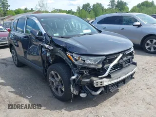 2018 Honda CR-V EX-L z VIN 7FARW2H80JE081102, wystawiony jako IAAI lot #42343687 z przebiegiem 104 464 mil mil oraz . Historia ofert i sprzedaży dostępna na DreamBid. Obrazek 1.