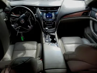 2014 Cadillac CTS AWD z VIN 1G6AW5SX6E0196501, wystawiony jako Copart lot #53929085 z przebiegiem 148 147 mil mil oraz Czysty tytuł • Clean title. Historia ofert i sprzedaży dostępna na DreamBid. Obrazek 8.