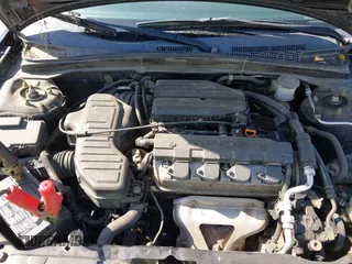 2005 Honda Civic VP z VIN 1HGEM22165L007215, wystawiony jako IAAI lot #41955606 z przebiegiem 192 193 mil mil oraz . Historia ofert i sprzedaży dostępna na DreamBid. Obrazek 10.