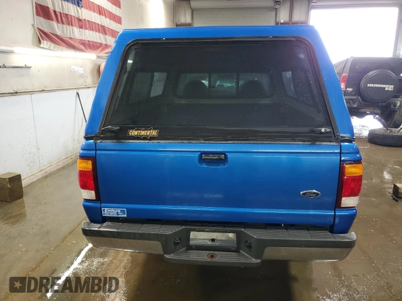 1999 Ford Ranger XLT with VIN 1FTYR10X0XUA52307, listed as a Copart auction lot 50044505 with 94,457 mi miles and Salvage title. Bid and sale history available at DreamBid. Image 6.
