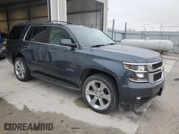 2019 Chevrolet Tahoe LT with VIN 1GNSKBKCXKR212450, listed as a Copart auction lot 54433205 with 119,907 mi miles and Salvage title. Bid and sale history available at DreamBid. Image 4.