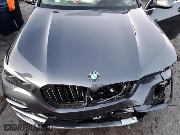 2021 BMW X5 sDrive40i with VIN 5UXCR4C03M9E13698, listed as a Copart auction lot 84158714 with 0 mi miles and Salvage Title. Bid and sale history available at carsss.com. Image 12.