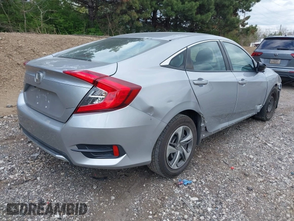 2019 Honda Civic LX with VIN 2HGFC2F61KH509233, listed as a IAAI auction lot 42048400 with 37,368 mi miles and . Bid and sale history available at DreamBid. Image 4.