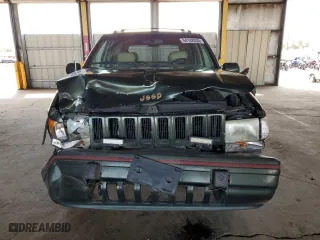 1995 Jeep Grand Cherokee Limited with VIN 1J4GZ78Y2SC723898, listed as a Copart auction lot 54142035 with 173,454 mi miles and Salvage Title. Bid and sale history available at carsss.com. Image 5.