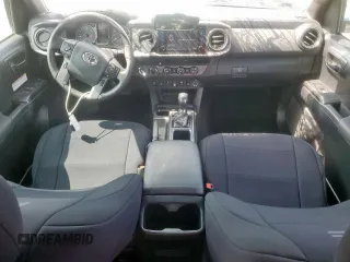 2019 Toyota Tacoma SR z VIN 5TFCZ5AN6KX211952, wystawiony jako Copart lot #58964815 z przebiegiem 97 774 mil mil oraz Szkoda całkowita • Salvage title. Historia ofert i sprzedaży dostępna na DreamBid. Obrazek 8.