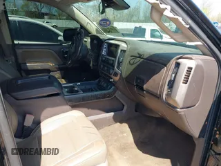 2014 GMC Sierra 1500 Denali z VIN 3GTU2WEC2EG302474, wystawiony jako IAAI lot #41881222 z przebiegiem 197 221 mil mil oraz . Historia ofert i sprzedaży dostępna na DreamBid. Obrazek 5.