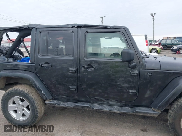 2008 Jeep Wrangler Unlimited X with VIN 1J8GA39148L577903, listed as a IAAI auction lot 41564957 with 95,359 mi miles. Bid and sale history available at carsss.com. Image 13.