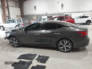 2016 Nissan Maxima Platinum with VIN 1N4AA6AP3GC404618, listed as a IAAI auction lot 42372458 with 133,968 mi miles and . Bid and sale history available at DreamBid. Image 14.