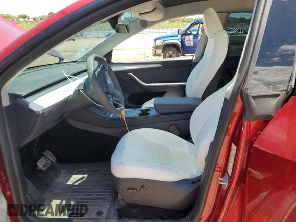 2024 Tesla Model Y Long Range z VIN 7SAYGDEE6RF156183, wystawiony jako Copart lot #61410155 z przebiegiem 27 112 mil mil oraz Szkoda całkowita • Salvage title. Historia ofert i sprzedaży dostępna na DreamBid. Obrazek 7.
