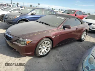 2007 BMW 6 Series 650i with VIN WBAEK13567CN80454, listed as a Copart auction lot 75070664 with 32,610 mi miles and Salvage Title. Bid and sale history available at carsss.com. Image 1.