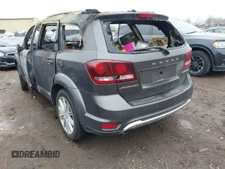 2014 Dodge Journey Crossroad with VIN 3C4PDCGG1ET277483, listed as a IAAI auction lot 42010460 with Not provided miles and . Bid and sale history available at DreamBid. Image 3.