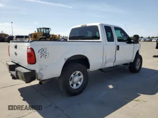 2014 Ford F-250 XL with VIN 1FT7X2B64EEB66846, listed as a Copart auction lot 57212565 with 261,721 mi miles and Salvage title. Bid and sale history available at DreamBid. Image 3.