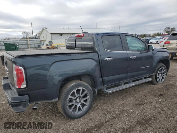 2021 GMC Canyon 4WD Denali with VIN 1GTG6EEN5M1213850, listed as a Copart auction lot 81138184 with 50,581 mi miles and Salvage Title. Bid and sale history available at carsss.com. Image 3.